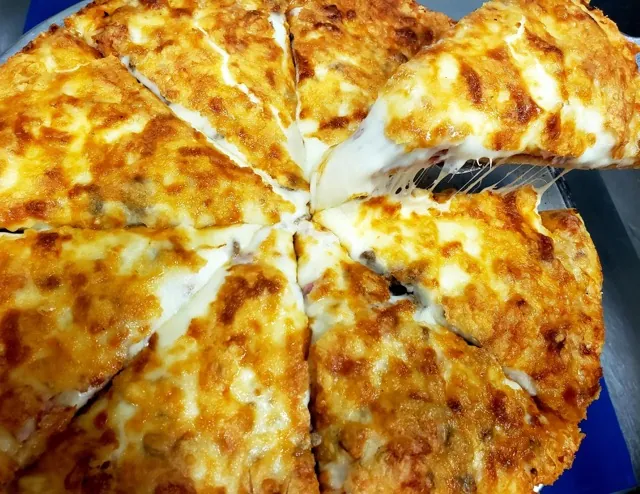 Cheese Pizza - Mozzarella and cheddar pizza at Cheryl's Country Kitchen in Airdrie