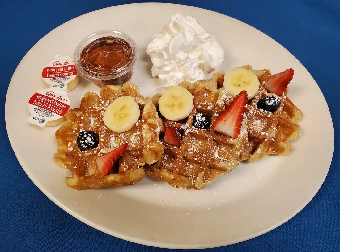 Pancakes, waffles and French toast with fresh fruit and whipped cream at Cheryl's Country Kitchen in Airdrie, AB