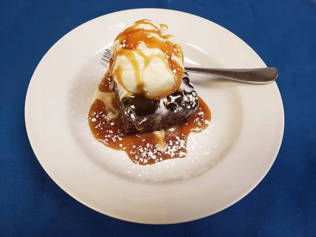 Sticky toffee pudding with vanilla ice cream and caramel sauce at Cheryl's Country Kitchen in Airdrie, AB